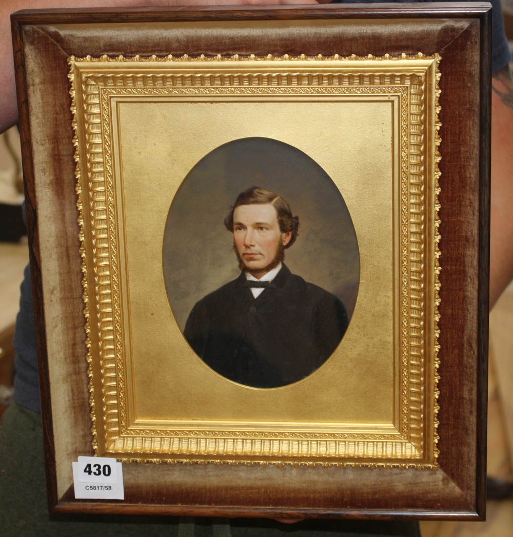 Victorian School, oil on board, Portrait of a gentleman, probably a hand tinted photographs, bears label verso for A. Macnab Photograph